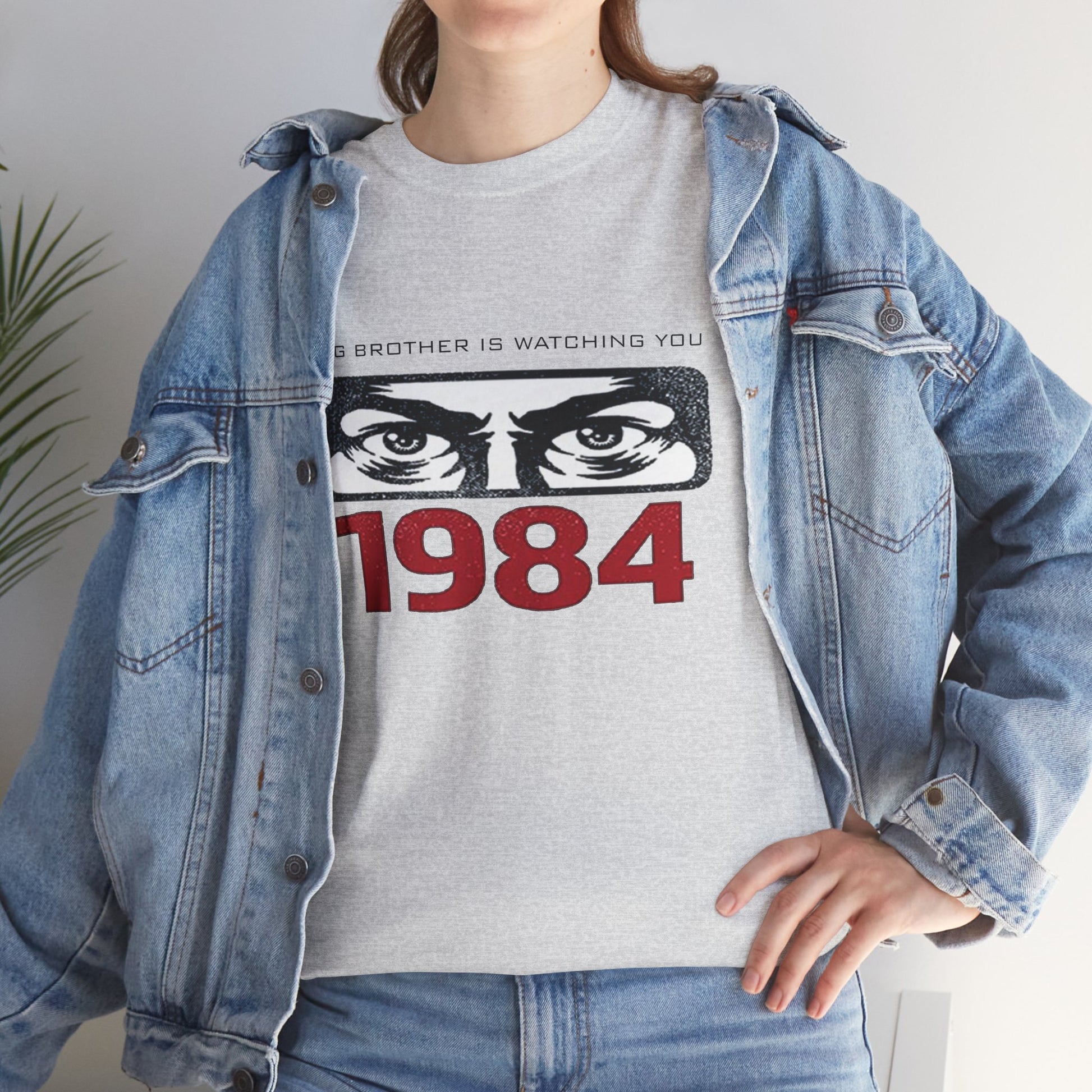 Gray Big Brother Is Watching You 1984 T-Shirt featuring George Orwell dystopian design and political protest imagery.