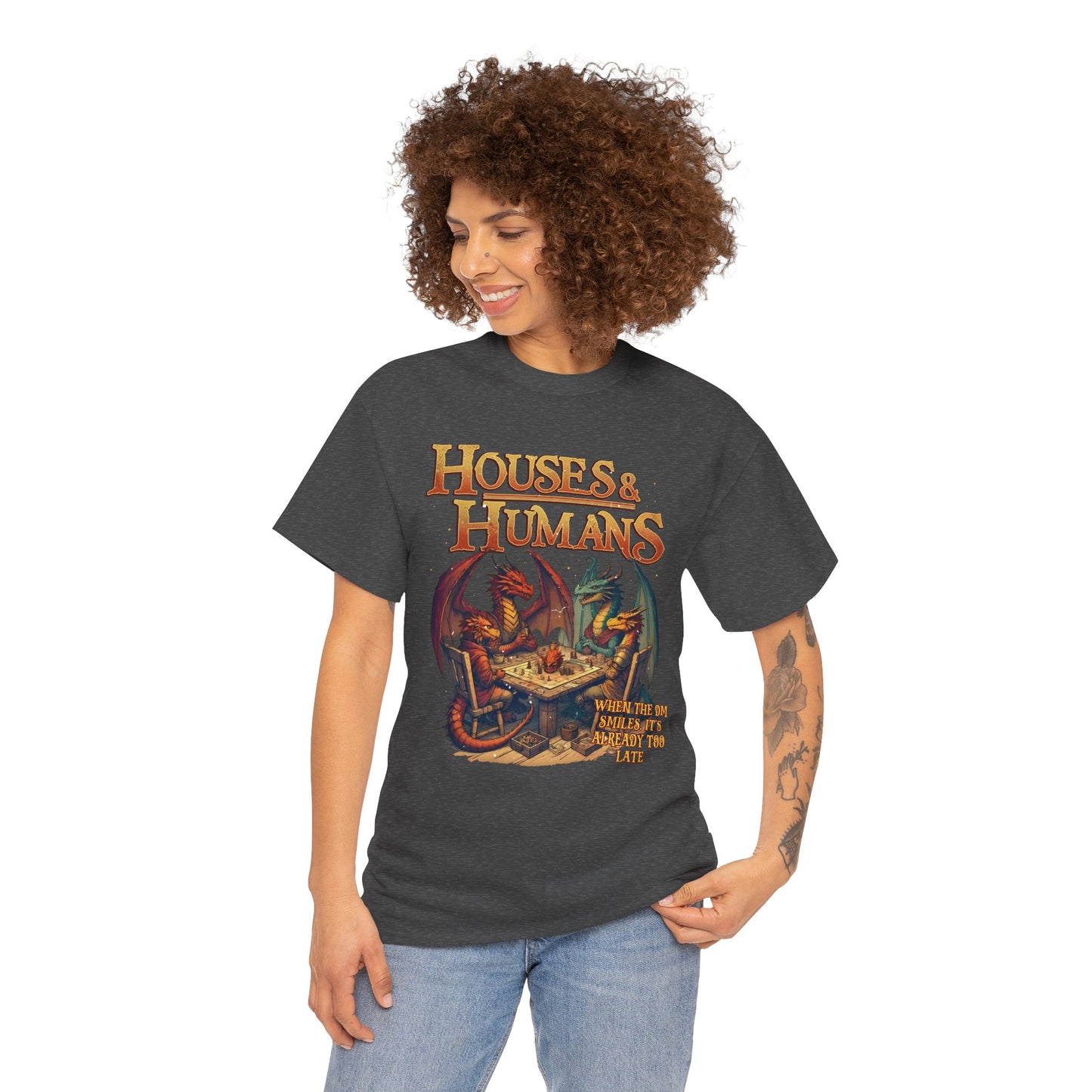 Gray T-shirt featuring colorful houses and human figures, perfect for RPG and TCG fans, made by Printify.