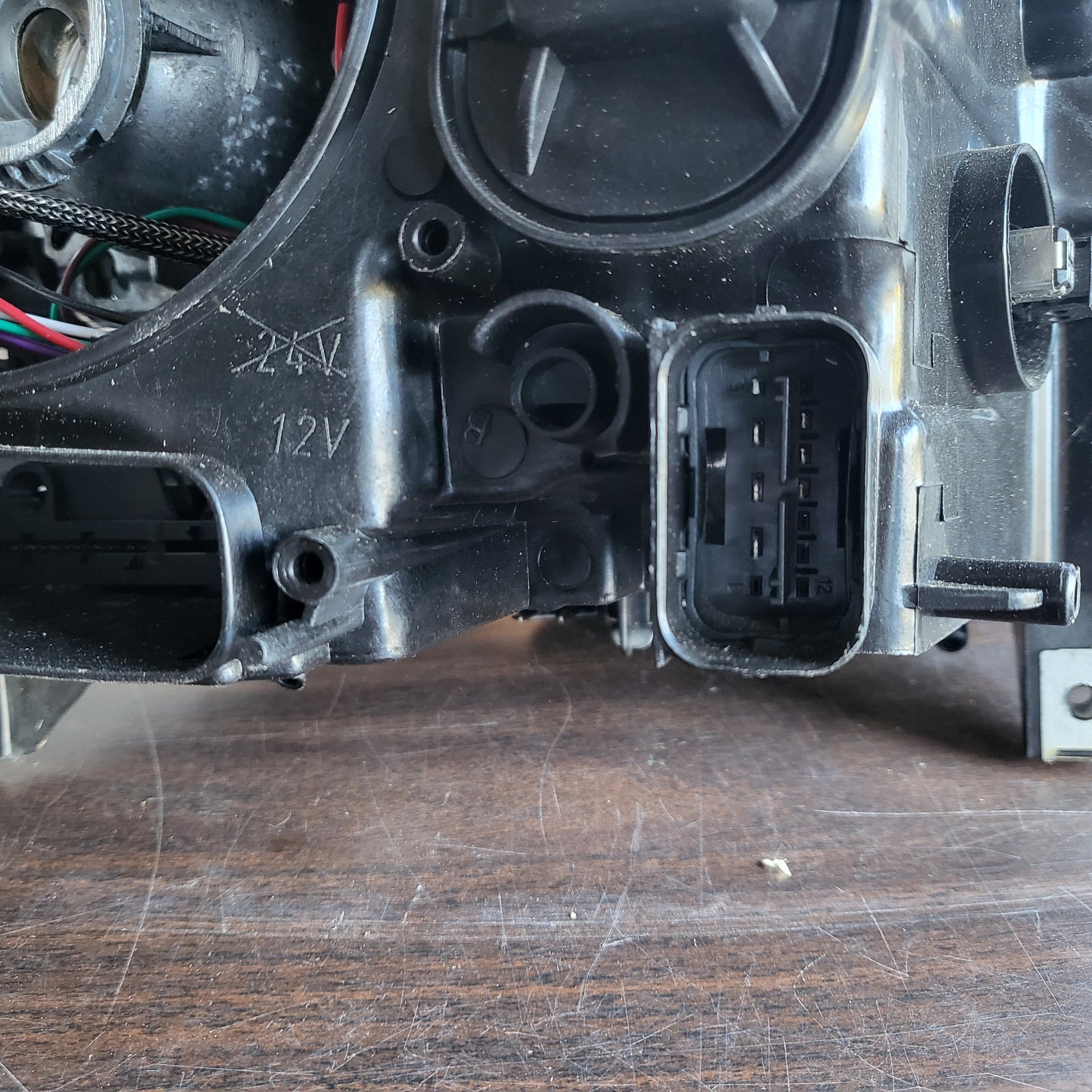 Secondhand Readers Hella Bi-Xenon headlight assembly for 2011-2013 BMW F10 5 Series driver side, front view showing lens and housing.