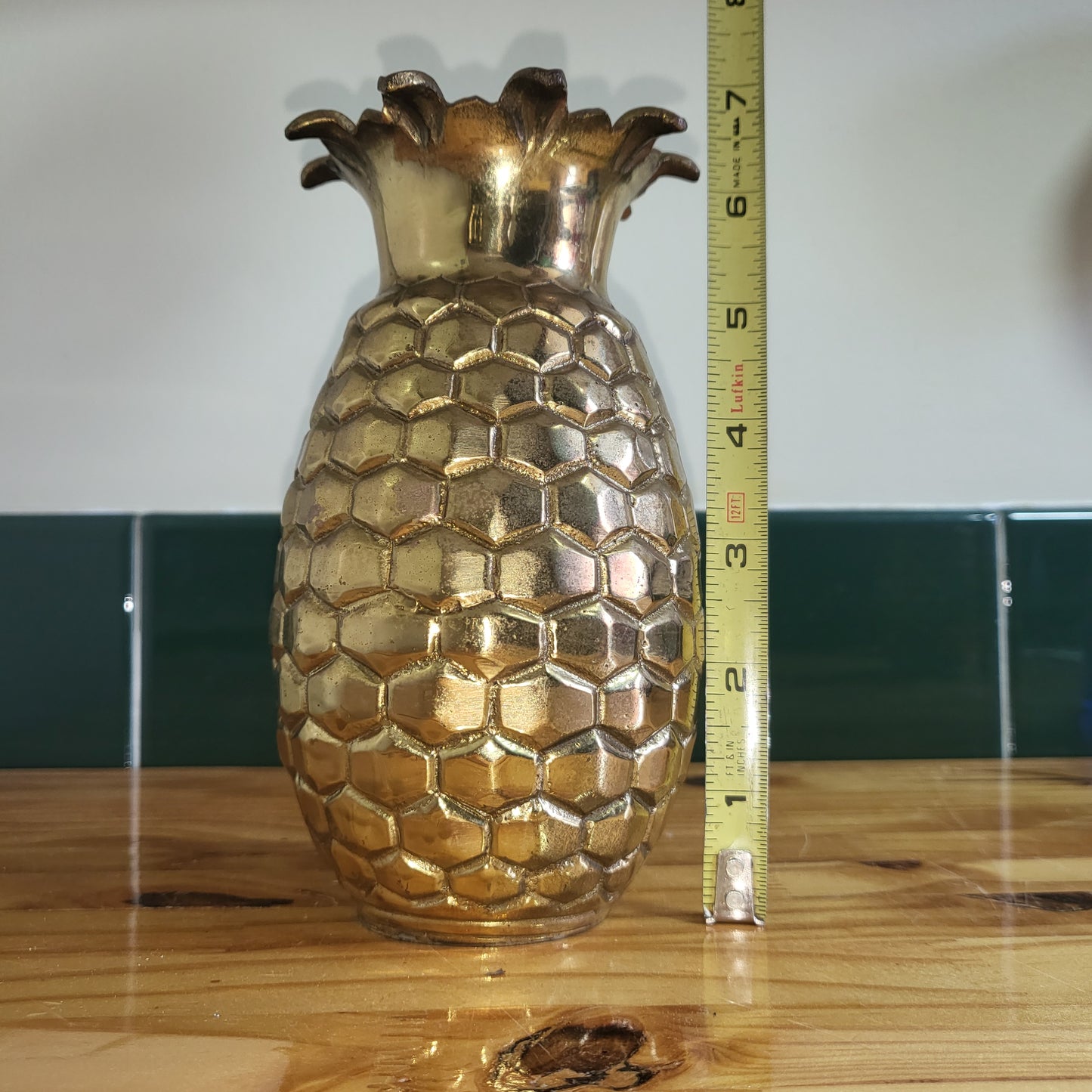 Pair of vintage brass pineapple vases in Hollywood Regency style, 2-piece set with intricate detailing and shiny finish.