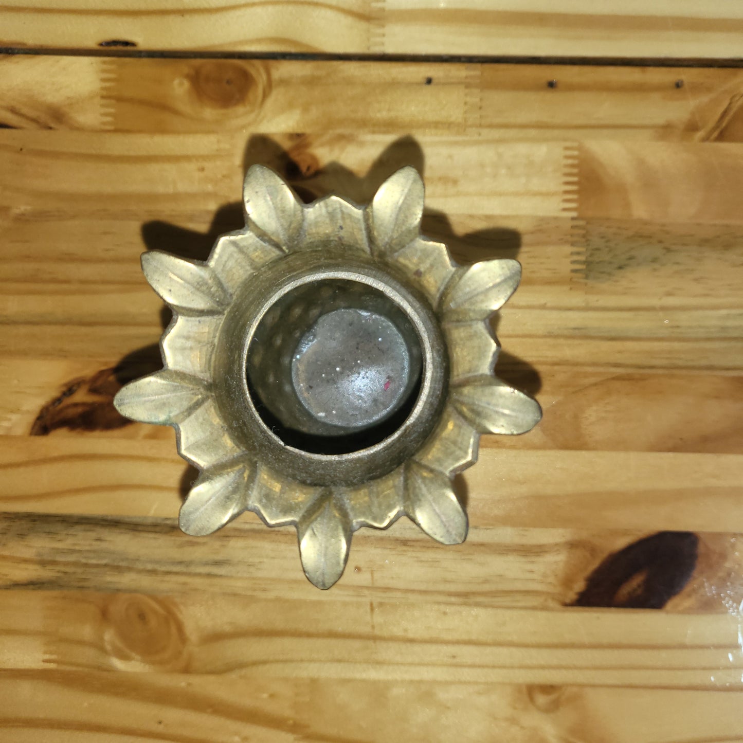 Set of two vintage brass pineapple vases in Hollywood Regency style, featuring ornate details and a polished finish.