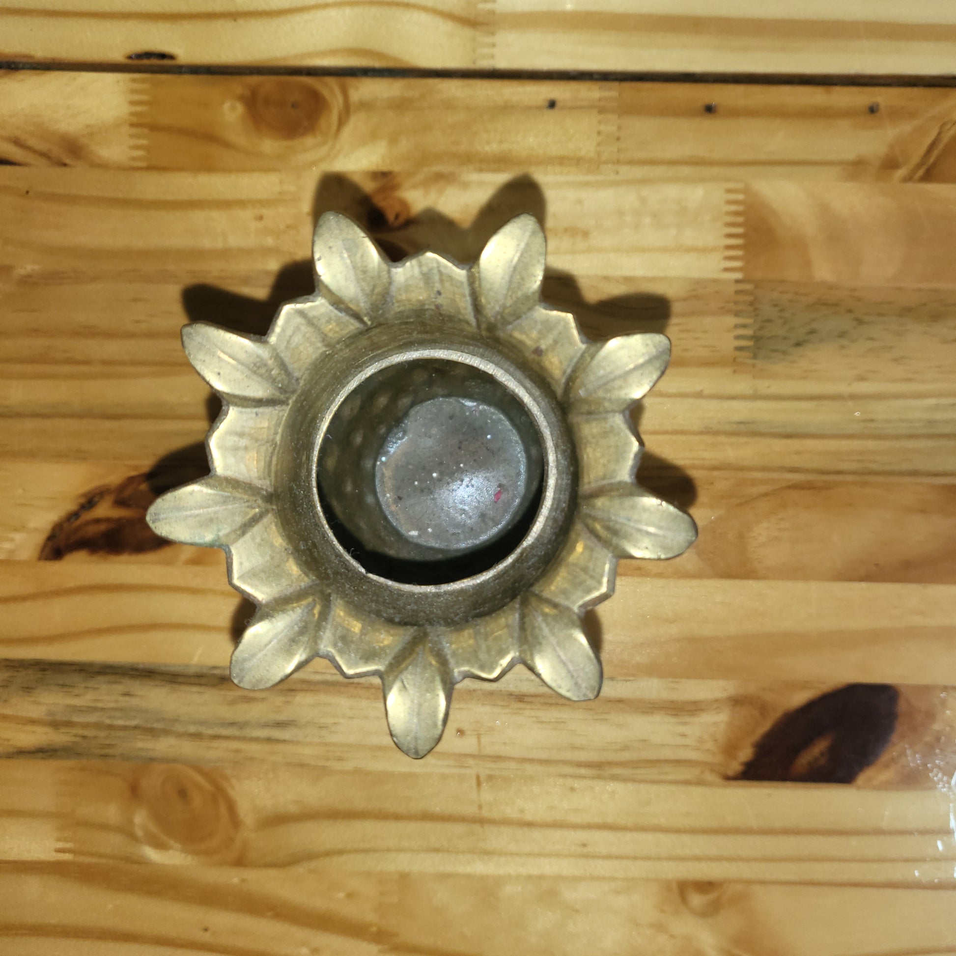 Set of two vintage brass pineapple vases in Hollywood Regency style, featuring ornate details and a polished finish.