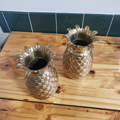 Pair of vintage brass pineapple vases in Hollywood Regency style, 2-piece set with ornate detailing and polished finish.