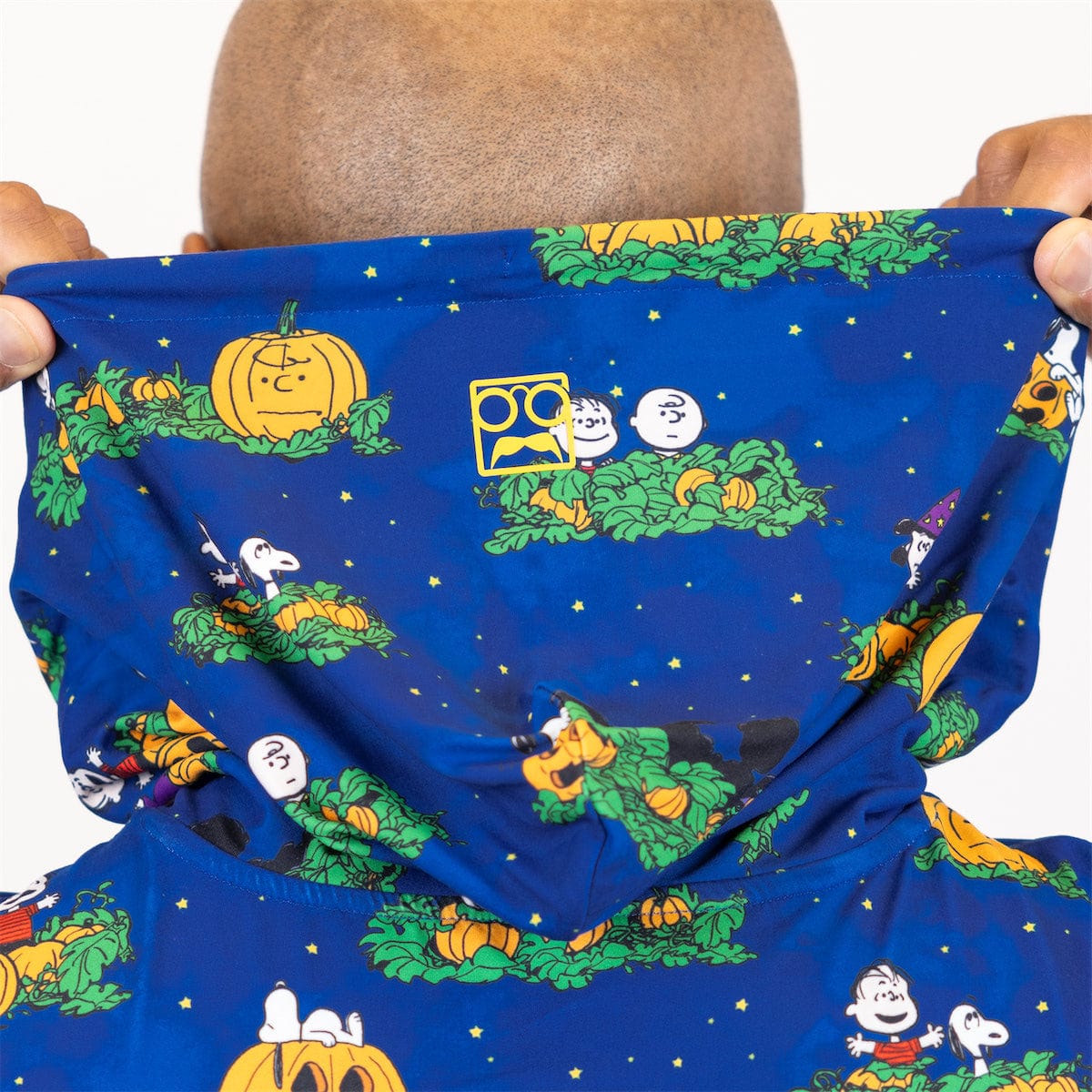 RSVLTS® Peanuts "It's the Great Pumpkin!" performance hoodie featuring festive Halloween pumpkin and Peanuts characters.